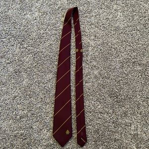 Maroon w/green,yellow,orange striped Holly Green Brand tie / B24